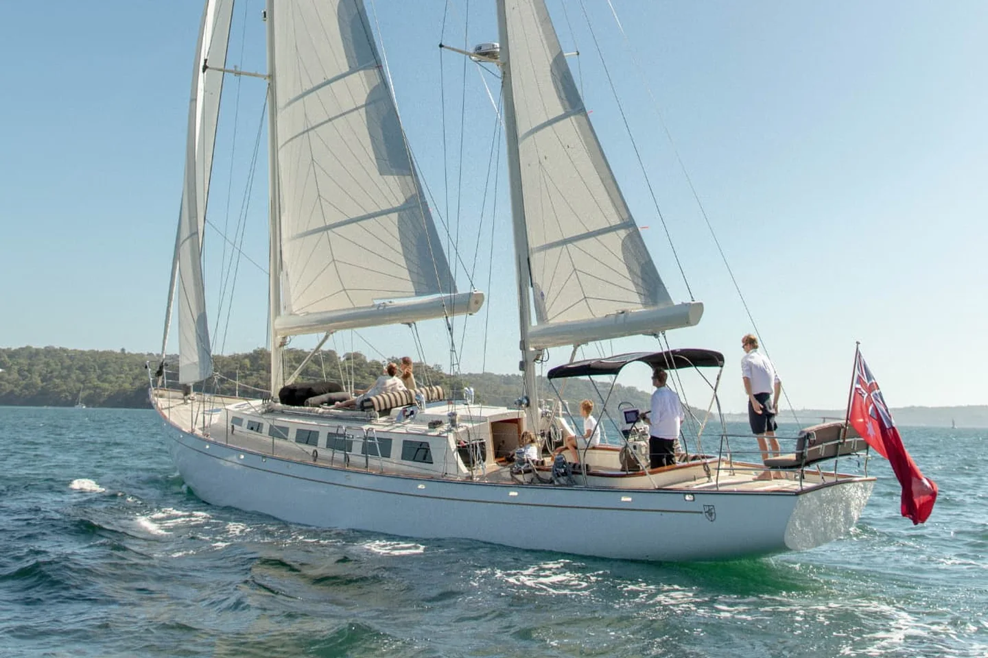 Sir Thomas Sopwith, a 72-foot classic sailing yacht, under full sail on Sydney Harbour