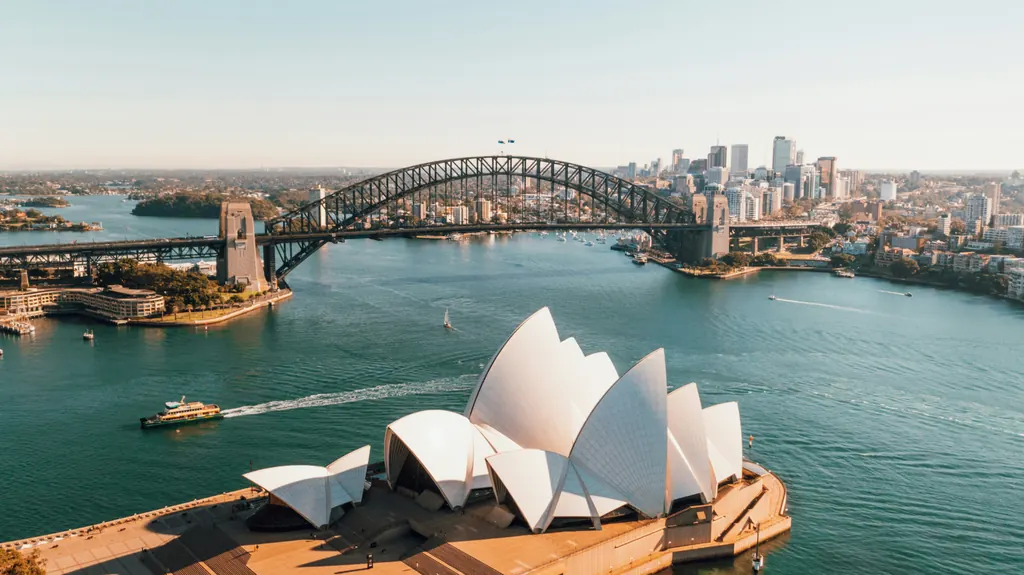 Sydney Opera House and the Harbour Bridge seen from above the water